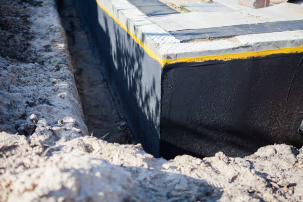 Professional Waterproofing technician working in Livingston, TN